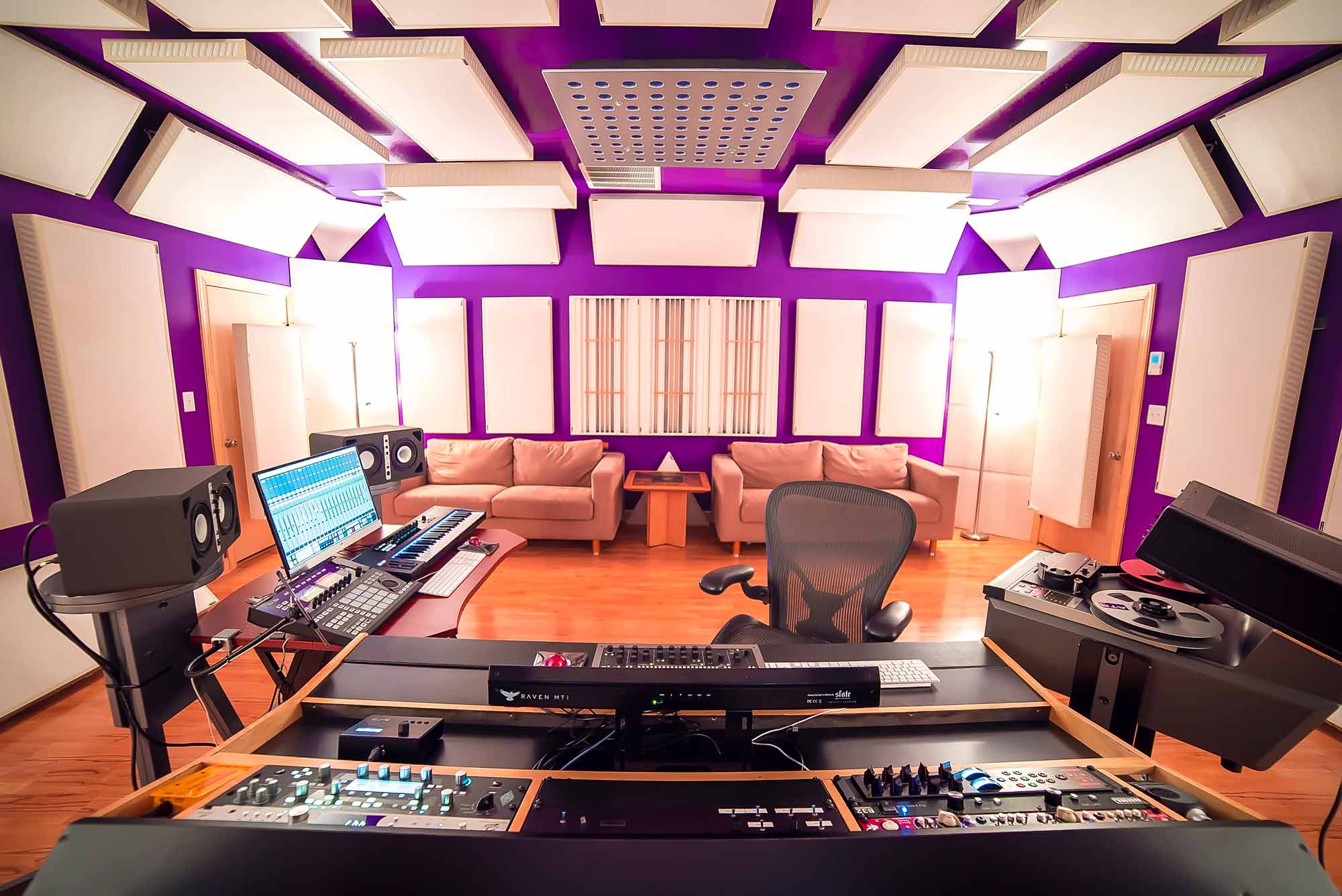 Cphonic Mastering contact page photo from behind desk